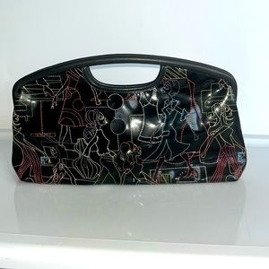 BCBG Girls multicolor stitched leather clutch. Great condition